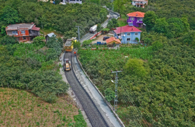 YOLLAR ASFALTLANIYOR, YÜZLER GÜLÜYOR